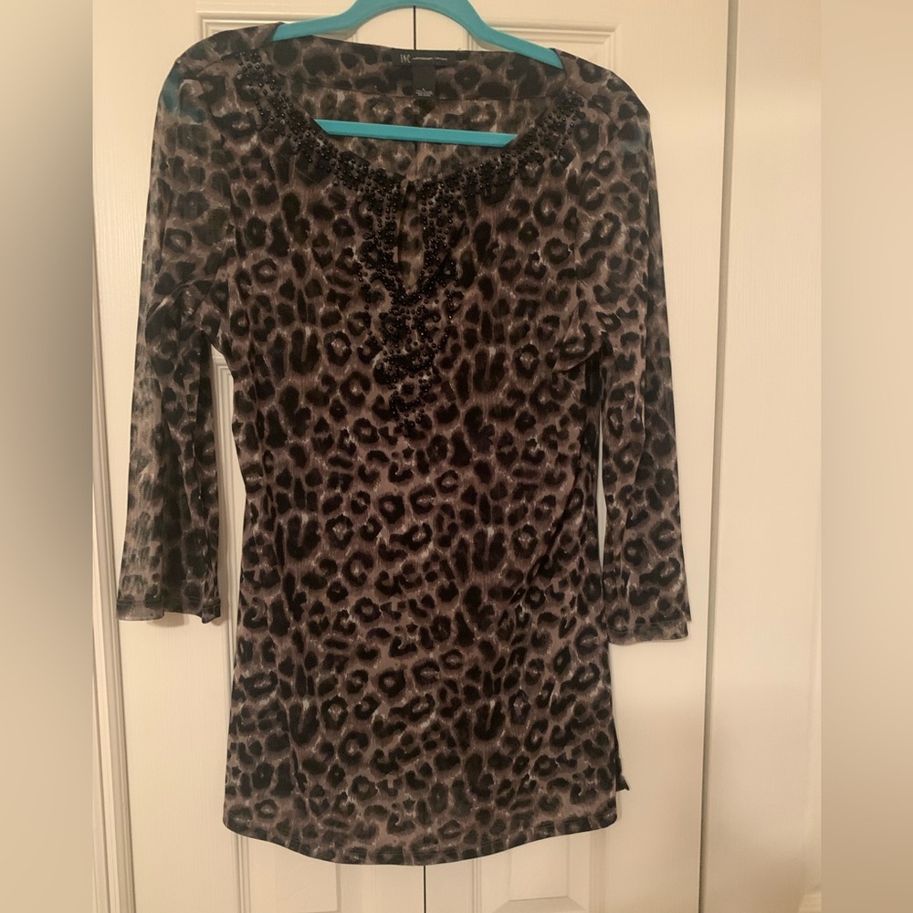 Inc leopard print and bead embellishments around the neck